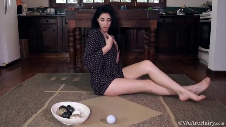 Brunette Ornella spreads and uses stones