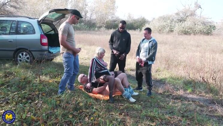 Mature Amy Takes on 4 Guys in Wild Gangbang